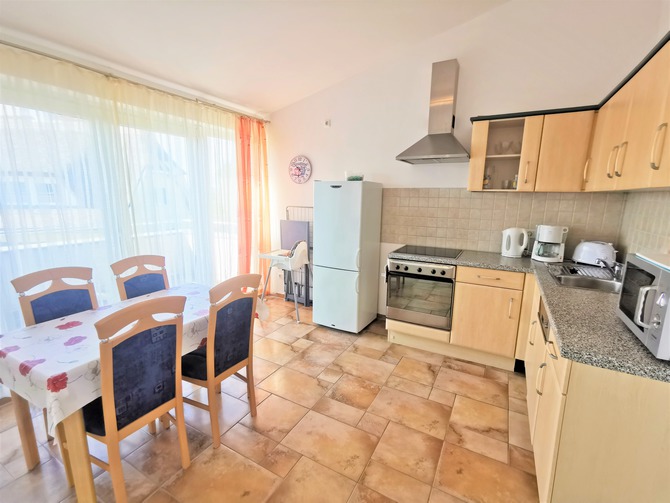 Ferienwohnung in Börgerende - Appartement 3 - Sunshine - Küche mit Südbalkon
