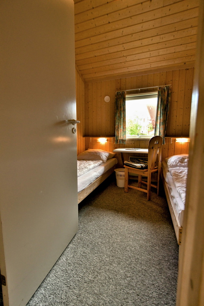 Ferienhaus in Pelzerhaken - Ferienhaus Typ D im Ferienpark AM WALDRAND - Schlafzimmer mit Einzelbetten