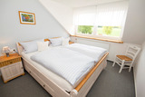 Ferienwohnung in Rettin - Ferienhof Hansen Seeigel - Schlafzimmer mit Doppelbett