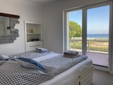 Ferienhaus in Haffkrug - Strandgang - Schlafzimmer Seeseite