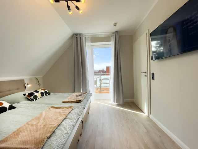 Ferienwohnung in Gr&ouml;mitz - A4 - Haus Deichwind | K&ouml;nigsberger Allee 36 - FERIENDOMIZIL HOLLICH - Bild 13